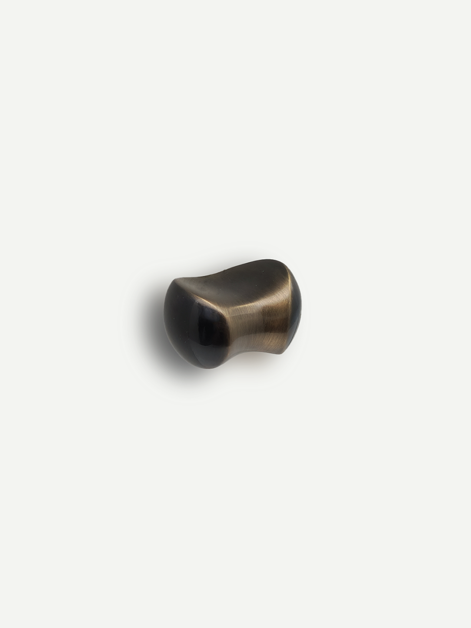 Designer cabinet hardware and knobs for home interiors in bronze