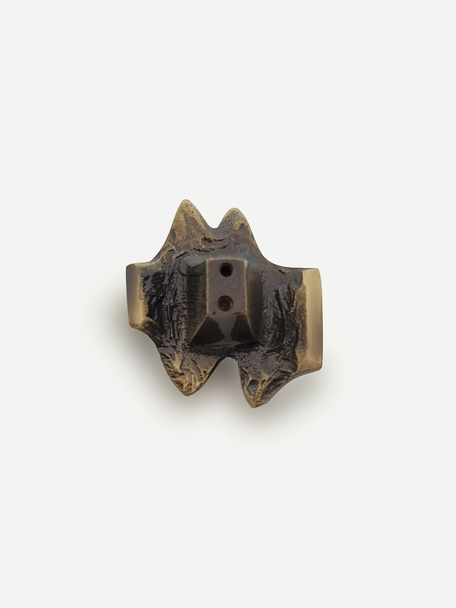 Nexus Cabinet Pull in a glossy bronze finish, featuring an abstract and modern design that adds a chic and luxurious touch to cabinets, dresser drawers, and bar cabinets.