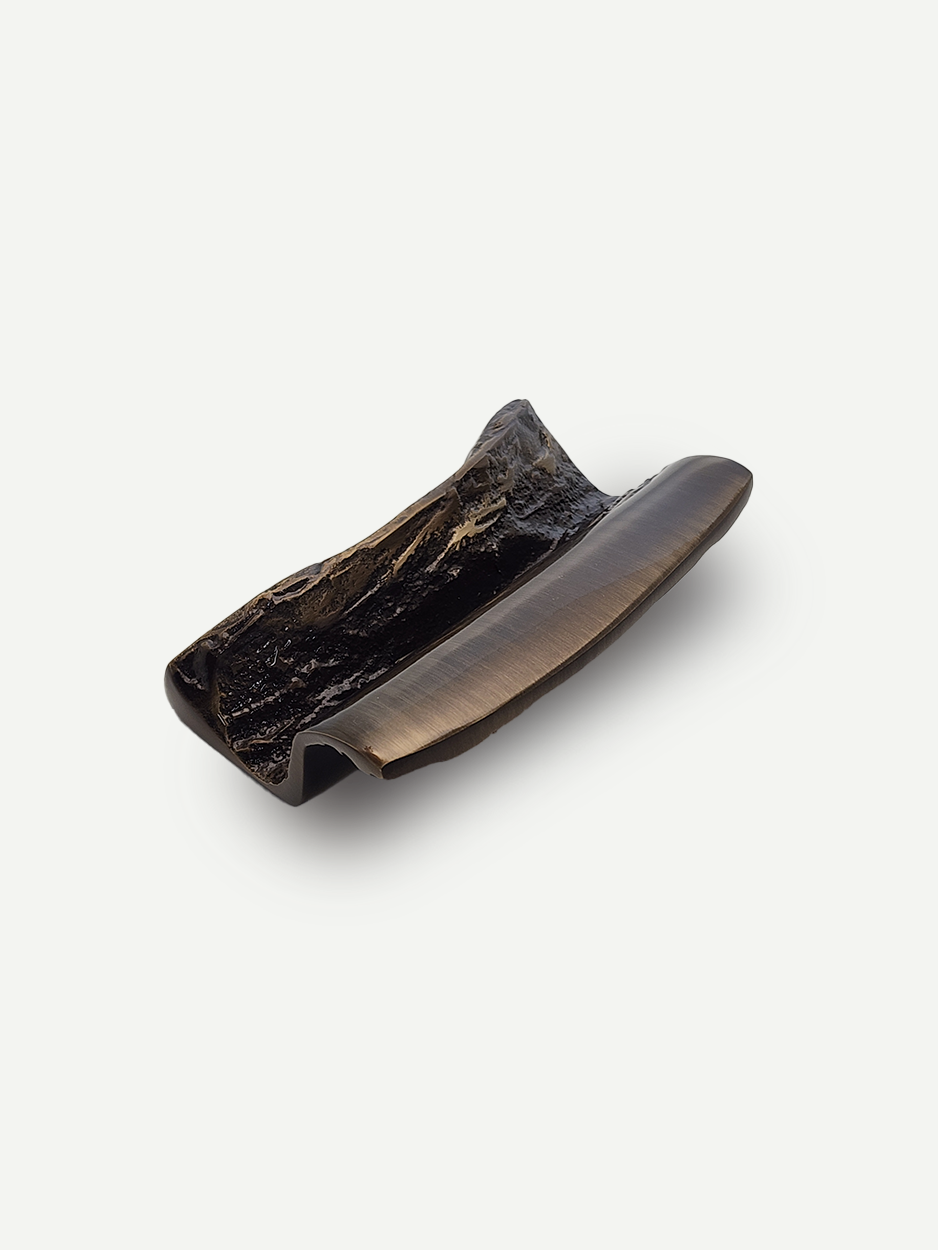 Textured cabinet pull in antique brass for bespoke wardrobes