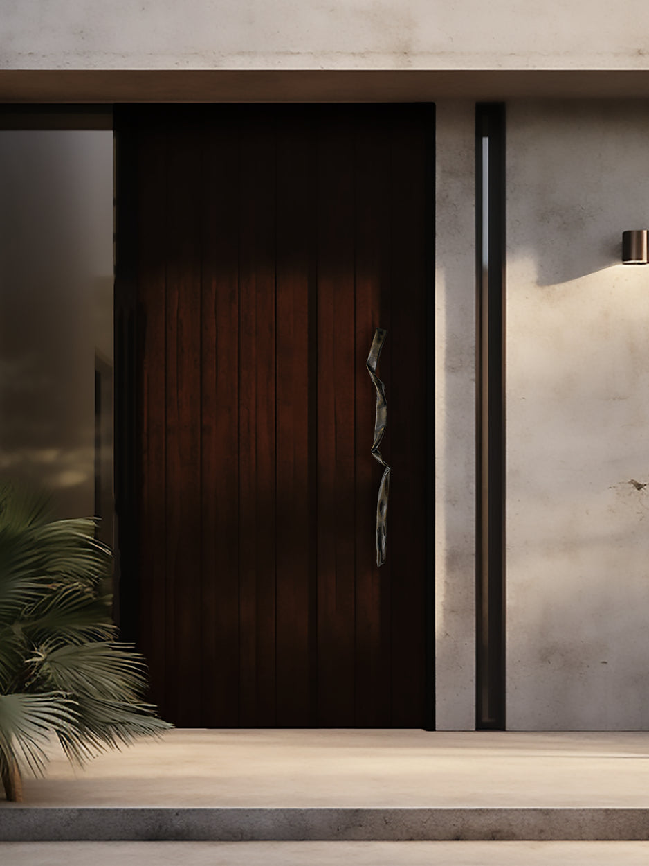 Handcrafted sculpted front door handles for bespoke homes