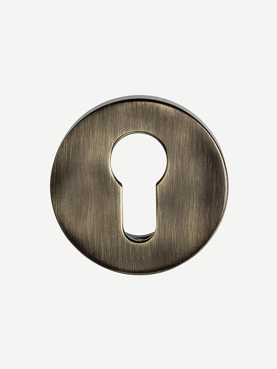 Image of the matching keyholes included with the RODULE Lever Handle set. The keyholes complement the handle’s sleek design, ensuring a cohesive look for modern interior doors.