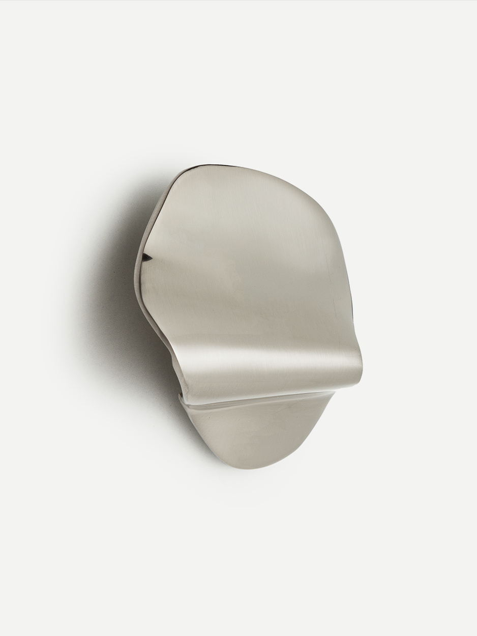 Solid brass pulls designed for modern kitchen cabinets in satin nickel.