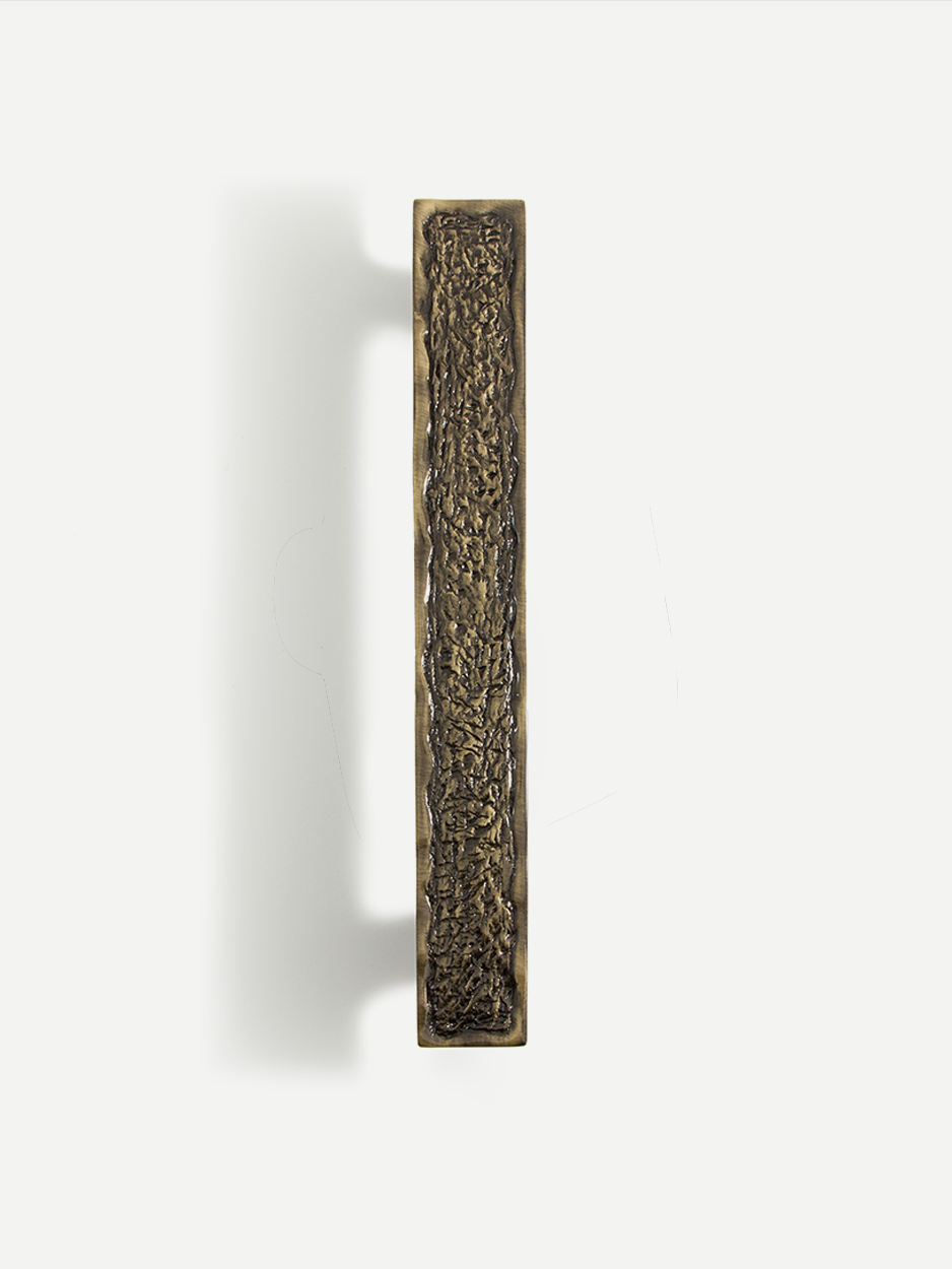 Long vertical handle pull for designer main doors.