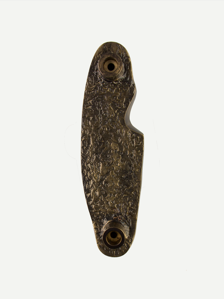Textured pull handle for wooden front doors for apartments.