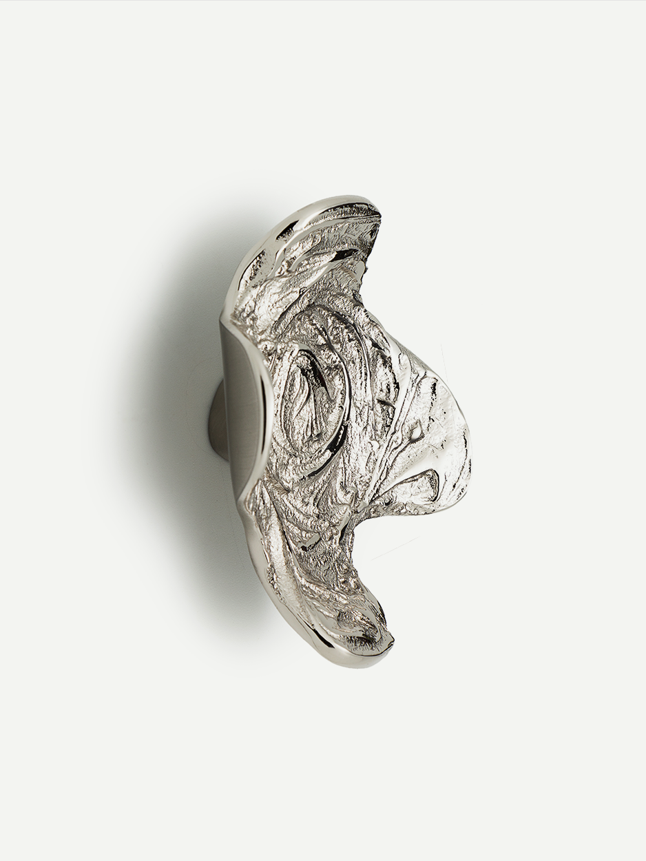 Handcrafted cabinet pull in brass for high-end cabinetry in satin nickel