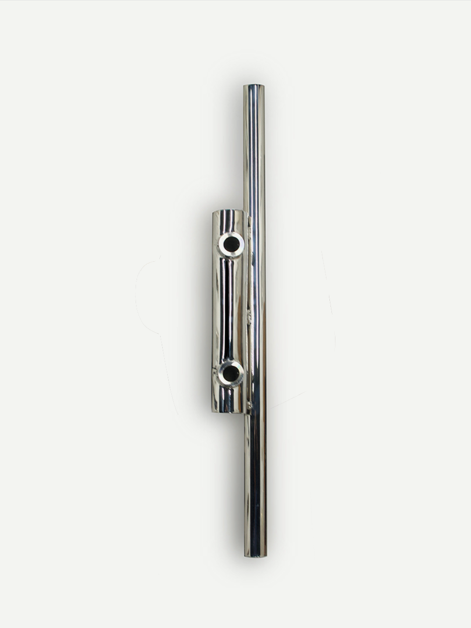 Linear entryway pull handle with minimalist form in stainless steel.