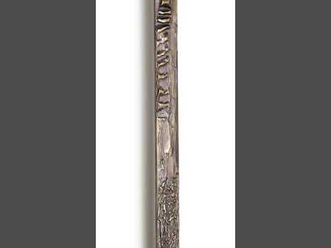 Distinctive textured pull handle for pivot entry doors.
