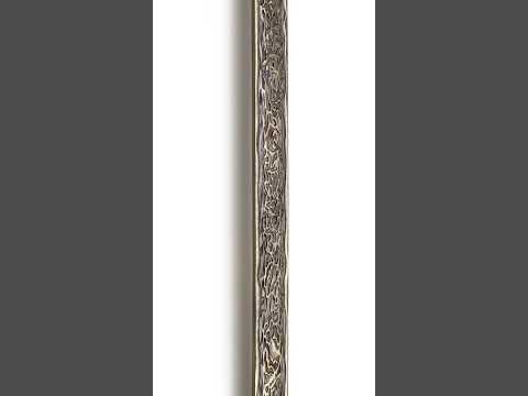 Long rustic brass pull handle for country house entry doors.