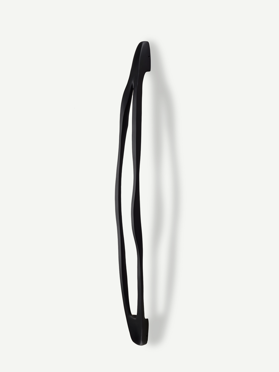 Unique sculptural front door handles in black matte