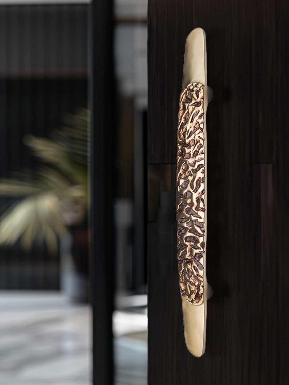 Contemporary brass front door handles for designer villas in gold