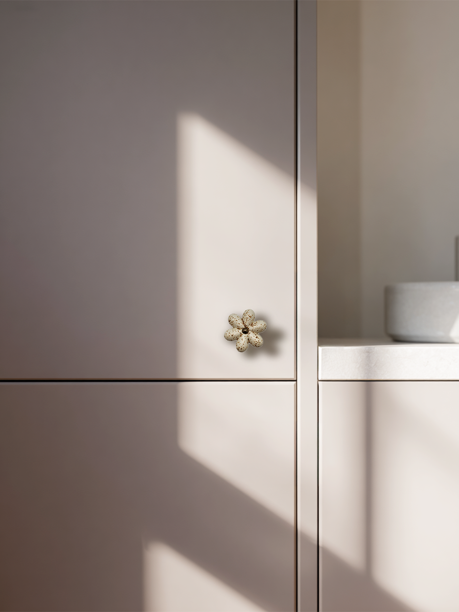 Flower ceramic knobs chosen by interior designers for modern kitchens.