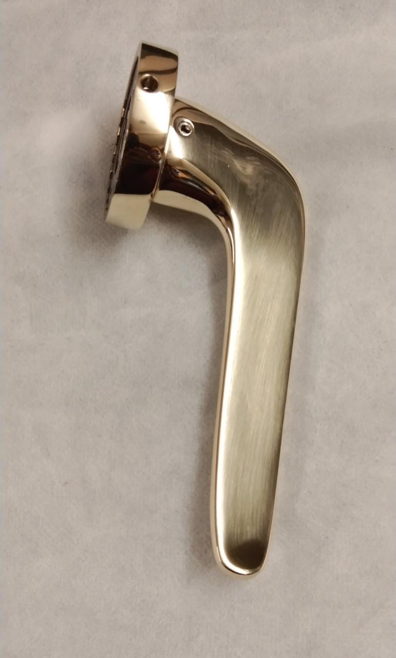 Lever door handles in polished brass