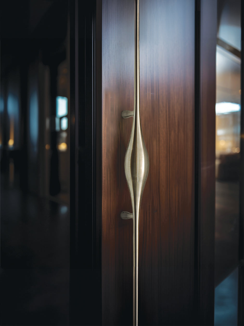 Custom main entrance handles for unique statement doors