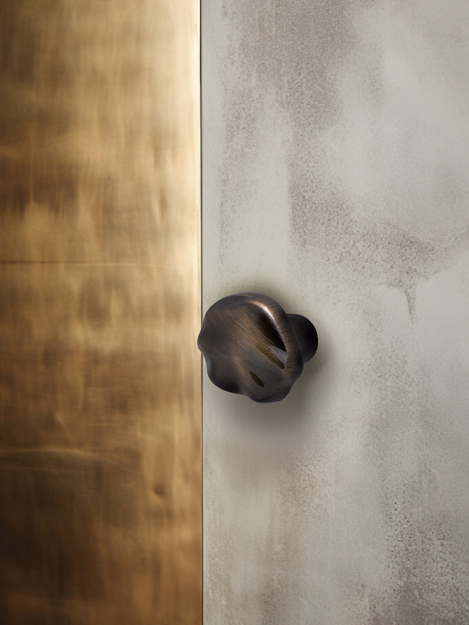 Designer brass cabinet knobs in bronze