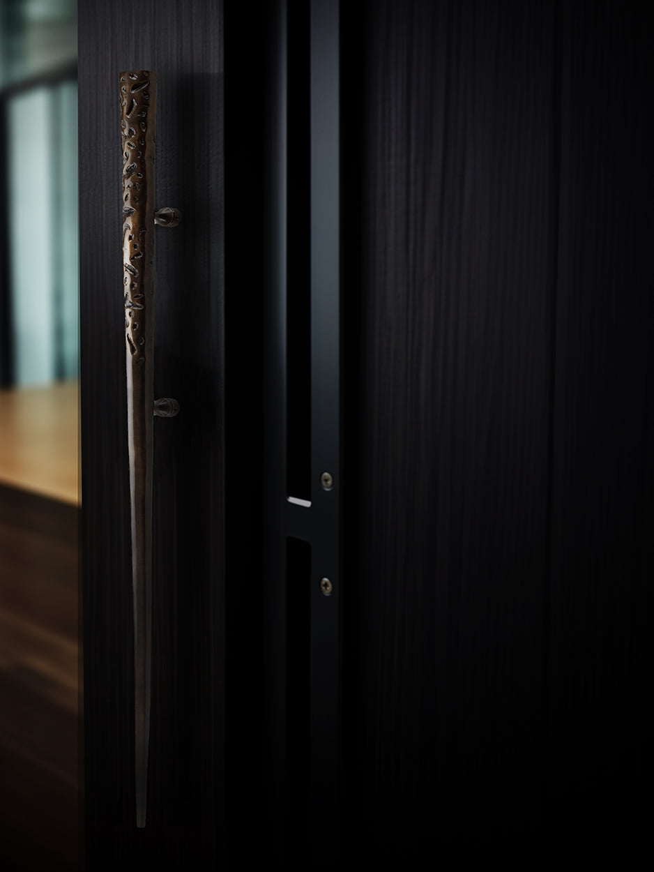 Luxury entry door handles with polished sculpted detailing