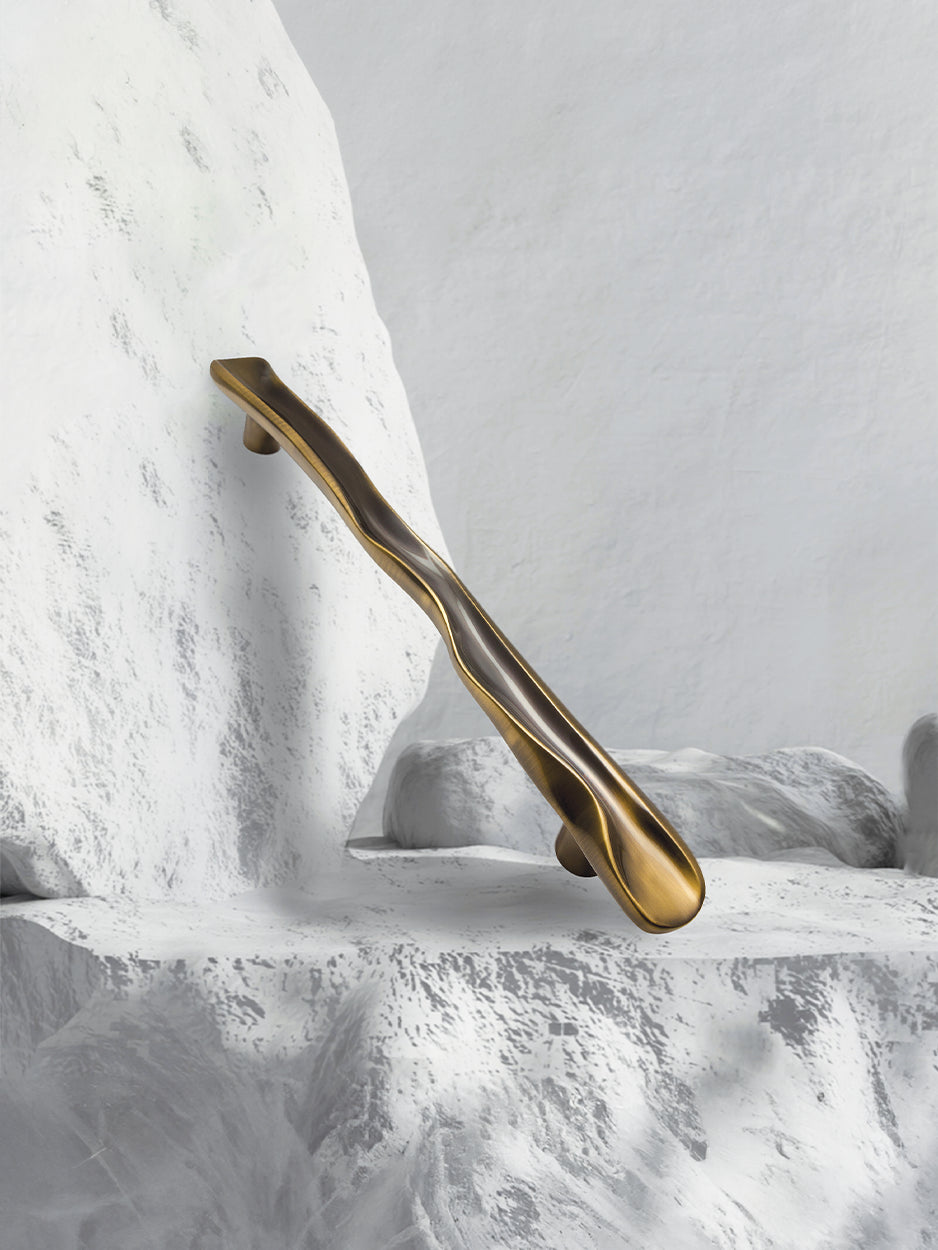 Sculpted front entry door handles for designer interiors