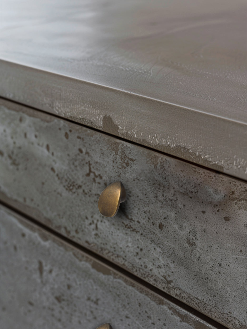 Mockup image of the Galaxy knob installed on furniture, demonstrating its stylish impact in a real-world setting. Keywords: luxury drawer knob mockup, furniture hardware, rustic modern interior design.