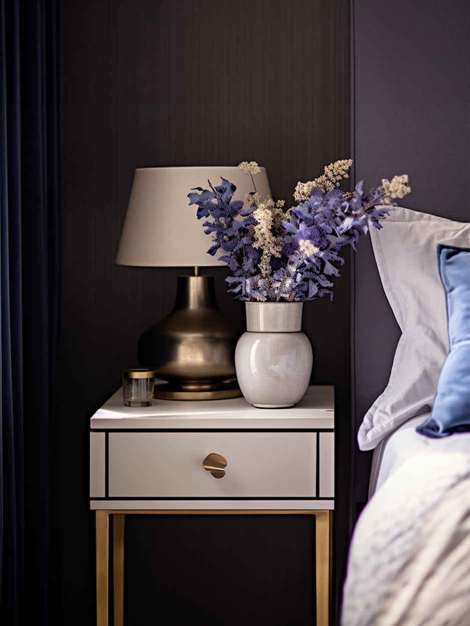 Mockup image displaying a brass cabinet pull mounted on a nightstand drawer, illustrating its stylish integration into bedroom furniture.