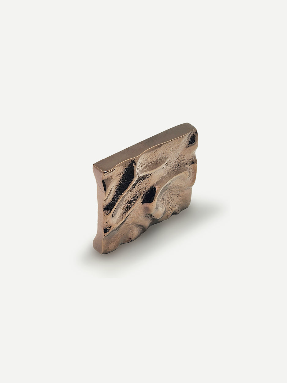 Furl Cabinet Knob in a rose gold PVD finish, highlighting its abstract, folded design that brings a stylish and contemporary vibe to bedroom and kitchen cabinets.