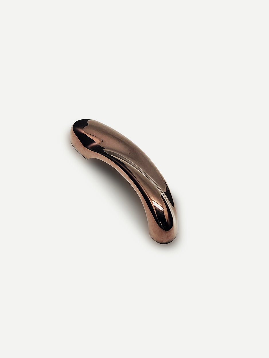 Flare Cabinet Pull in a rose gold PVD finish, highlighting its chic, modern form that brings a stylish flair to cabinet drawers in both bedrooms and kitchens.