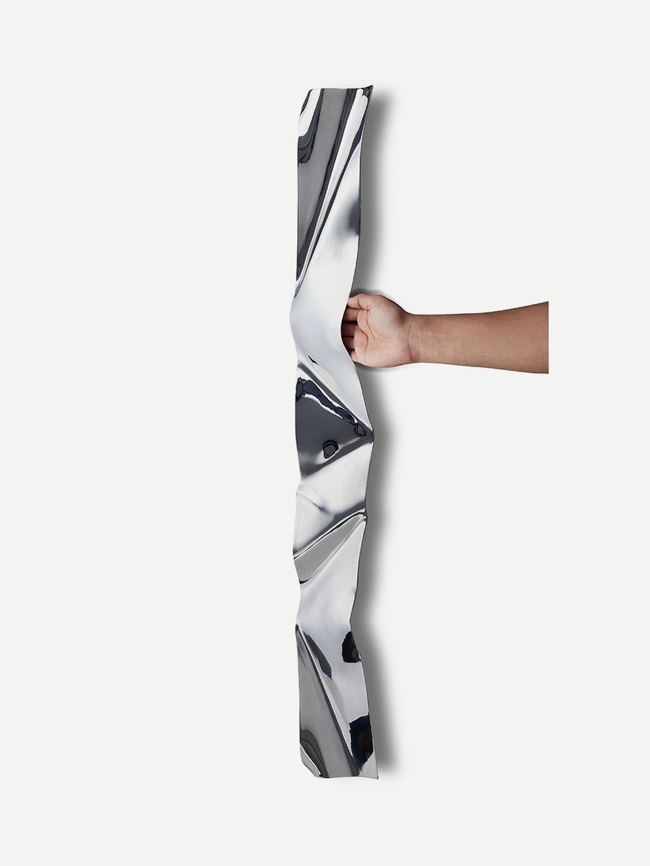 Alternate front view of the CRUNCH door handle, showcasing the intricate crunched texture and sleek stainless steel finish. This unique design element adds a bold, artistic flair to your entrance.