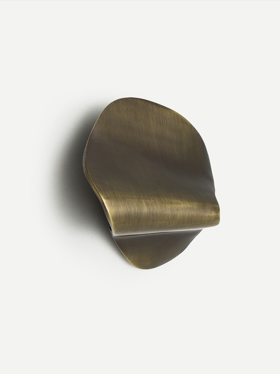 Minimalist pulls for contemporary bathroom drawers.