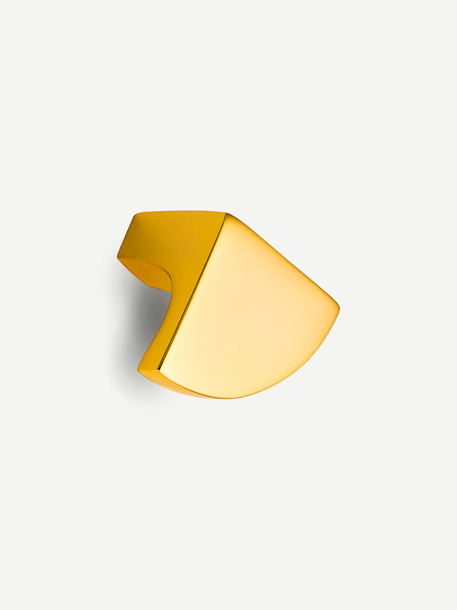 Sleek triangle cabinet knobs for refined wardrobe interiors.