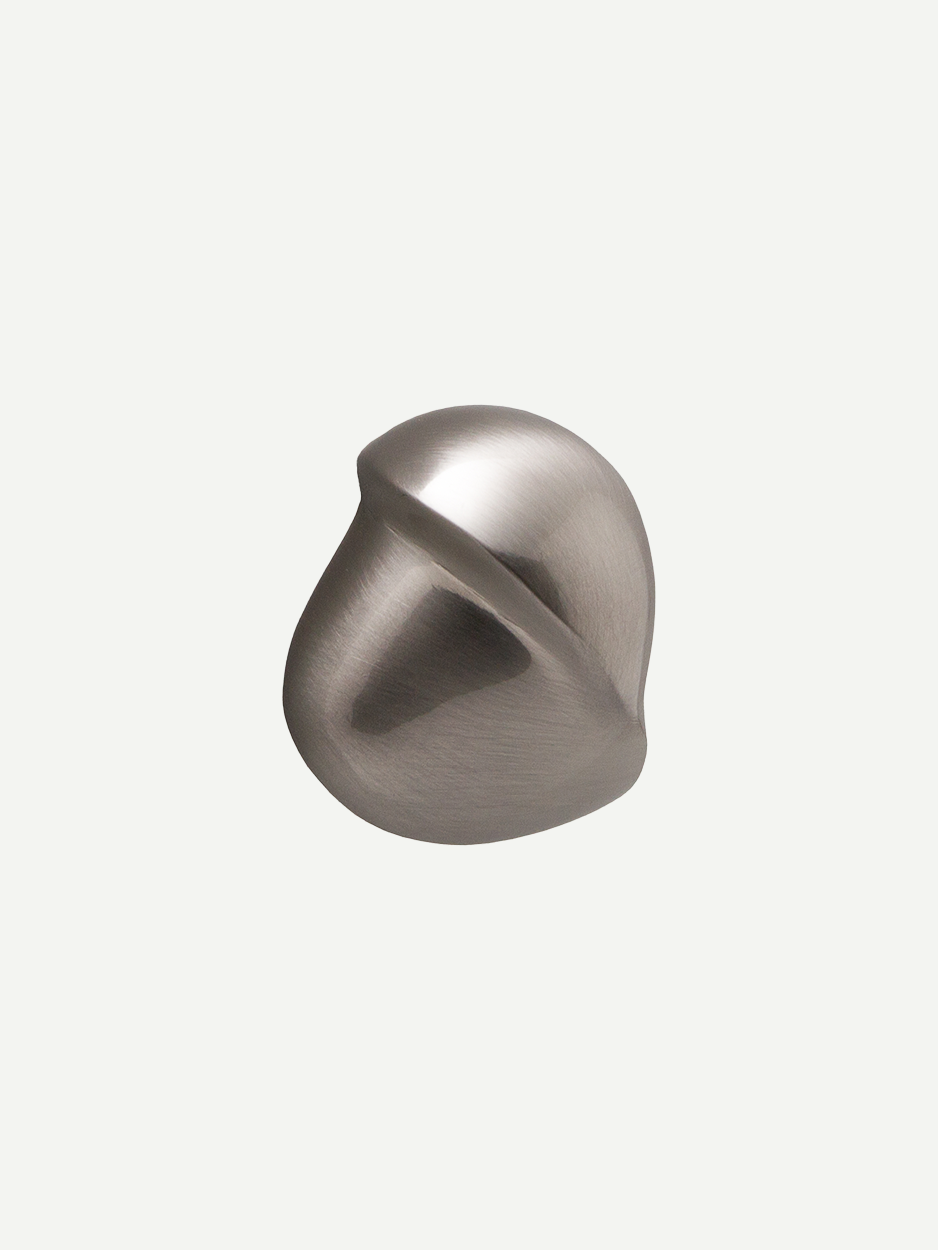 Image of the Comet Brass Cabinet Knob in satin nickel finish, showcasing its modern design and practical elegance, suitable for various furniture pieces.