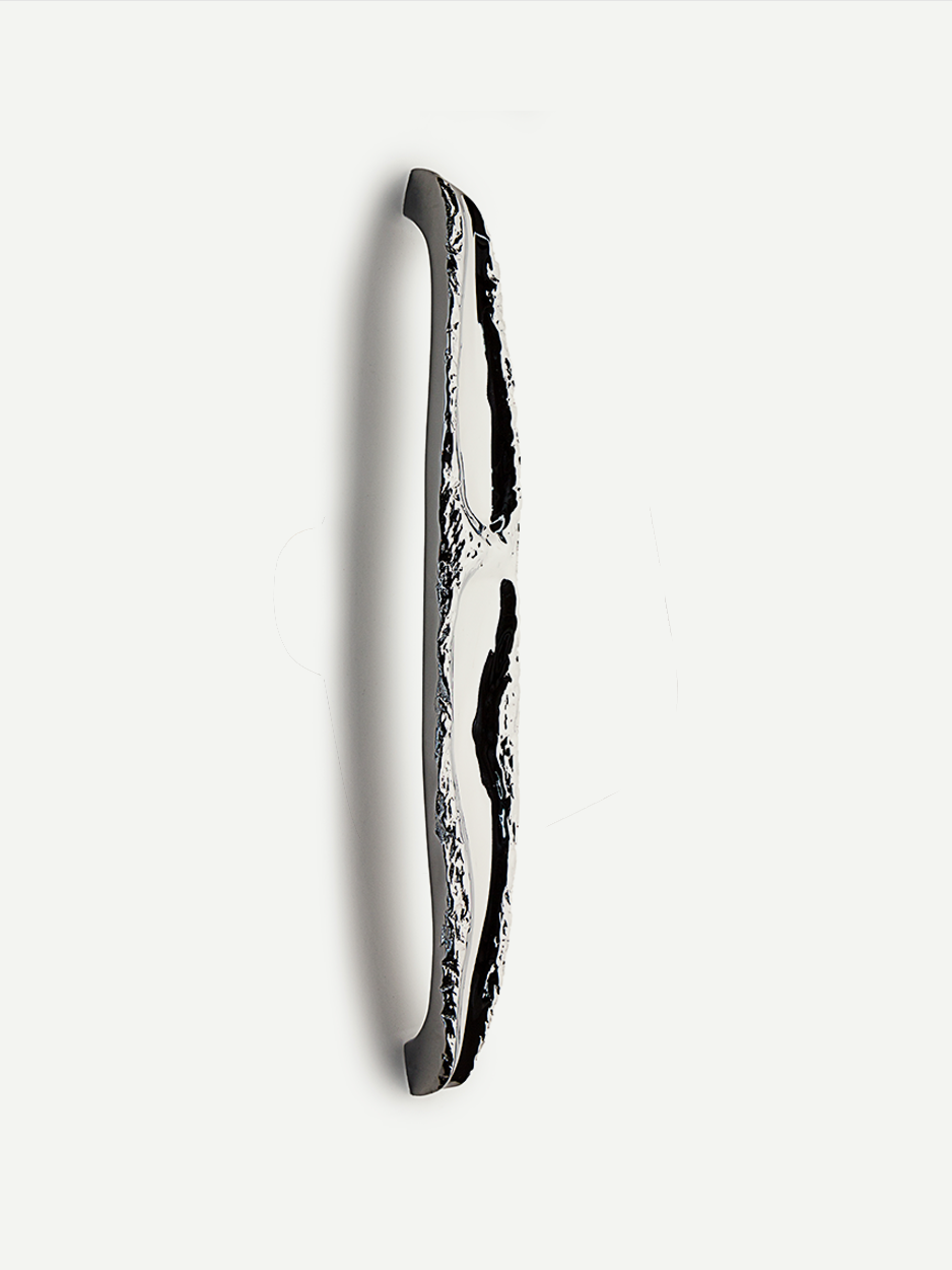Statement-making brass door handle for custom interior projects
