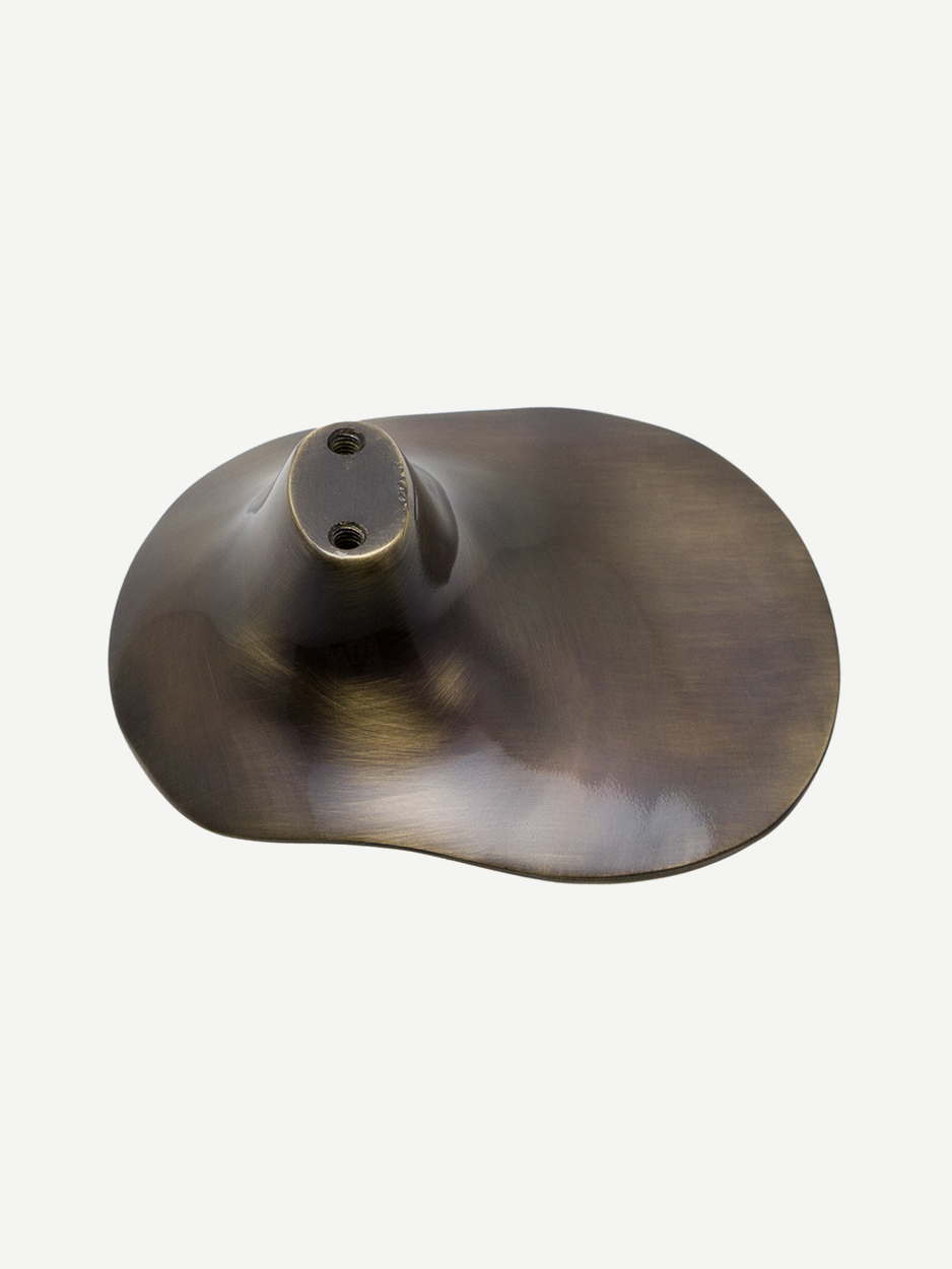 Luxury glossy bronze mushroom-shaped cabinet pull, organic curves, sleek design, enhance doors cabinets, high-end home decor.