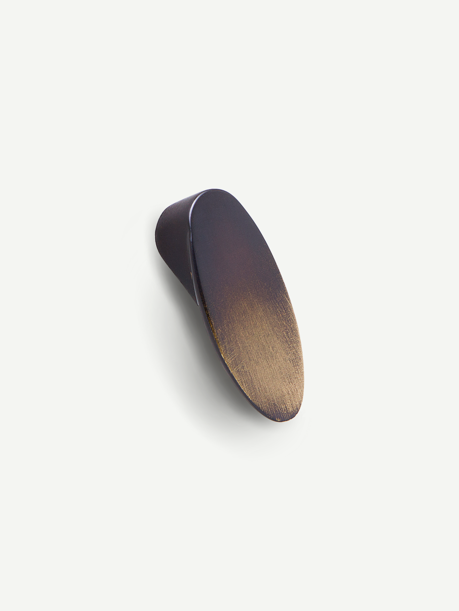 Image of the Ellipsis knob in a glossy bronze finish, emphasizing its rich and reflective surface. Keywords: glossy bronze cabinet knob, luxury hardware, contemporary drawer handle.