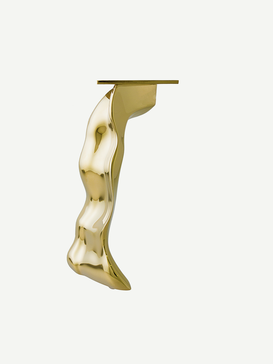 Gold PVD finish of the SCORIA furniture leg, displaying its rippled, undulating shape that enhances the luxurious feel of cabinets or sofas.