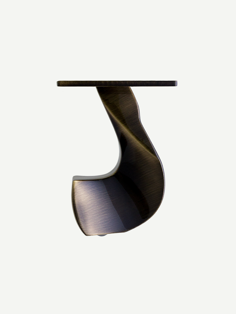 Breccia furniture leg in a glossy bronze finish, showcasing its sleek and versatile design, perfect for adding ultramodern elegance to cabinets or sofas.