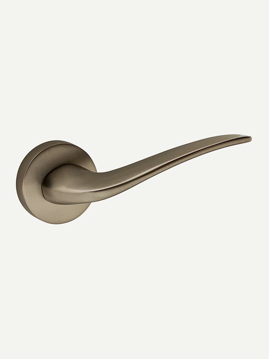 Image of the PLANE Lever Handle in satin nickel finish. The sleek, simple form adds a touch of elegance and modernity to any door, providing a clean and stylish appearance suitable for various décor styles.