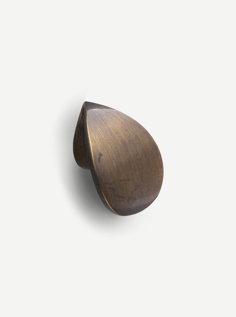 Image of the Galaxy knob in a glossy bronze finish, showcasing its simple yet classic design with a rustic vibe. Keywords: glossy bronze cabinet knob, rustic hardware, modern drawer handle.