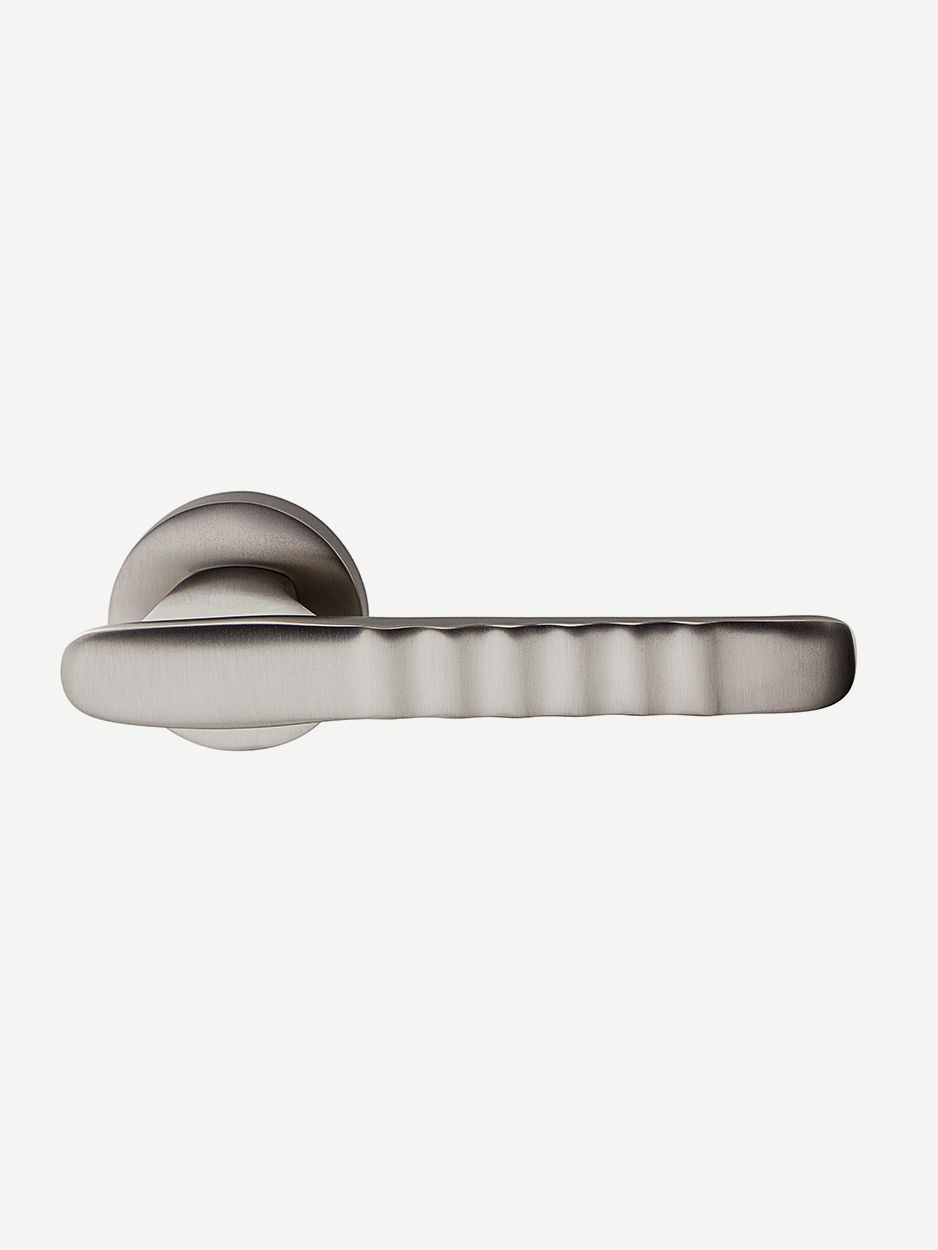 Contemporary solid brass lever handles for custom doors