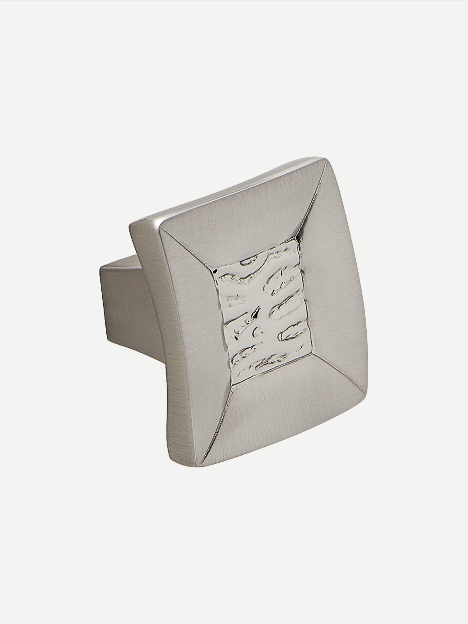 Satin nickel cabinet knob featuring Klingon design, blending abstract art with Star Trek inspiration. Ideal for contemporary interiors seeking modern, artistic accents.