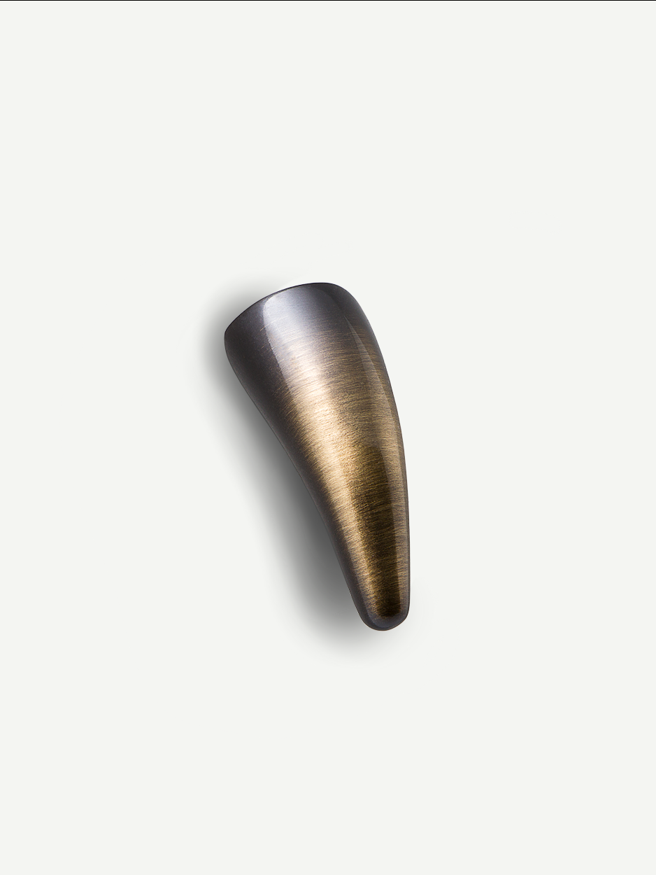 Glossy bronze brass cabinet knob with a stunning reflective surface, perfect for accessorizing modern interiors and adding a touch of luxury to dresser drawers and kitchen cabinets.