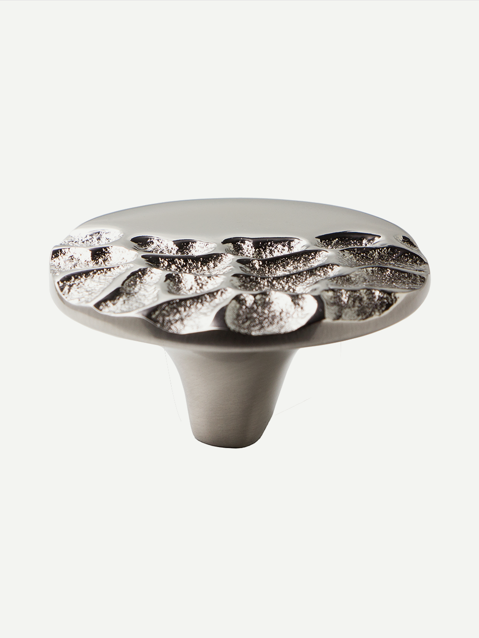 Knob in a satin nickel matte finish, showcasing its aesthetic design and textured surface, perfect for enhancing cabinets and drawers while complementing biophilic and nature-inspired interior styles.