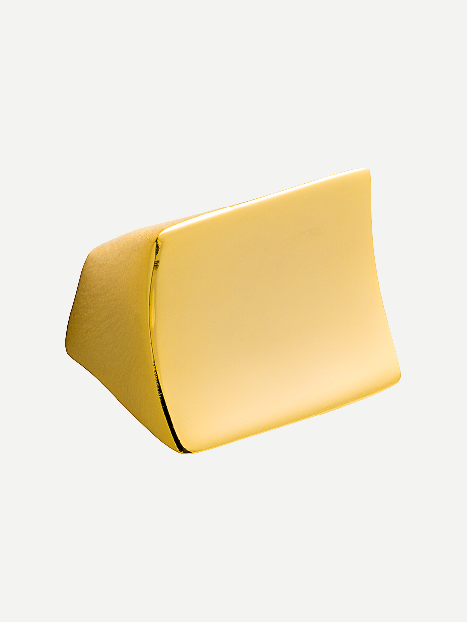 Gold Satellite cabinet knob with fluid geometry and a concave surface, adding a touch of luxury to personal and professional spaces, such as study and commercial furniture.