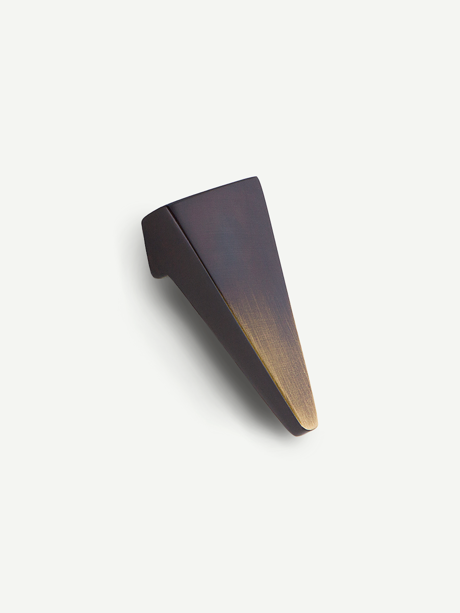 Image of the Trigon knob in a glossy bronze finish, emphasizing its rich and reflective surface. Keywords: bronze cabinet knob, glossy finish hardware, elegant drawer handle.