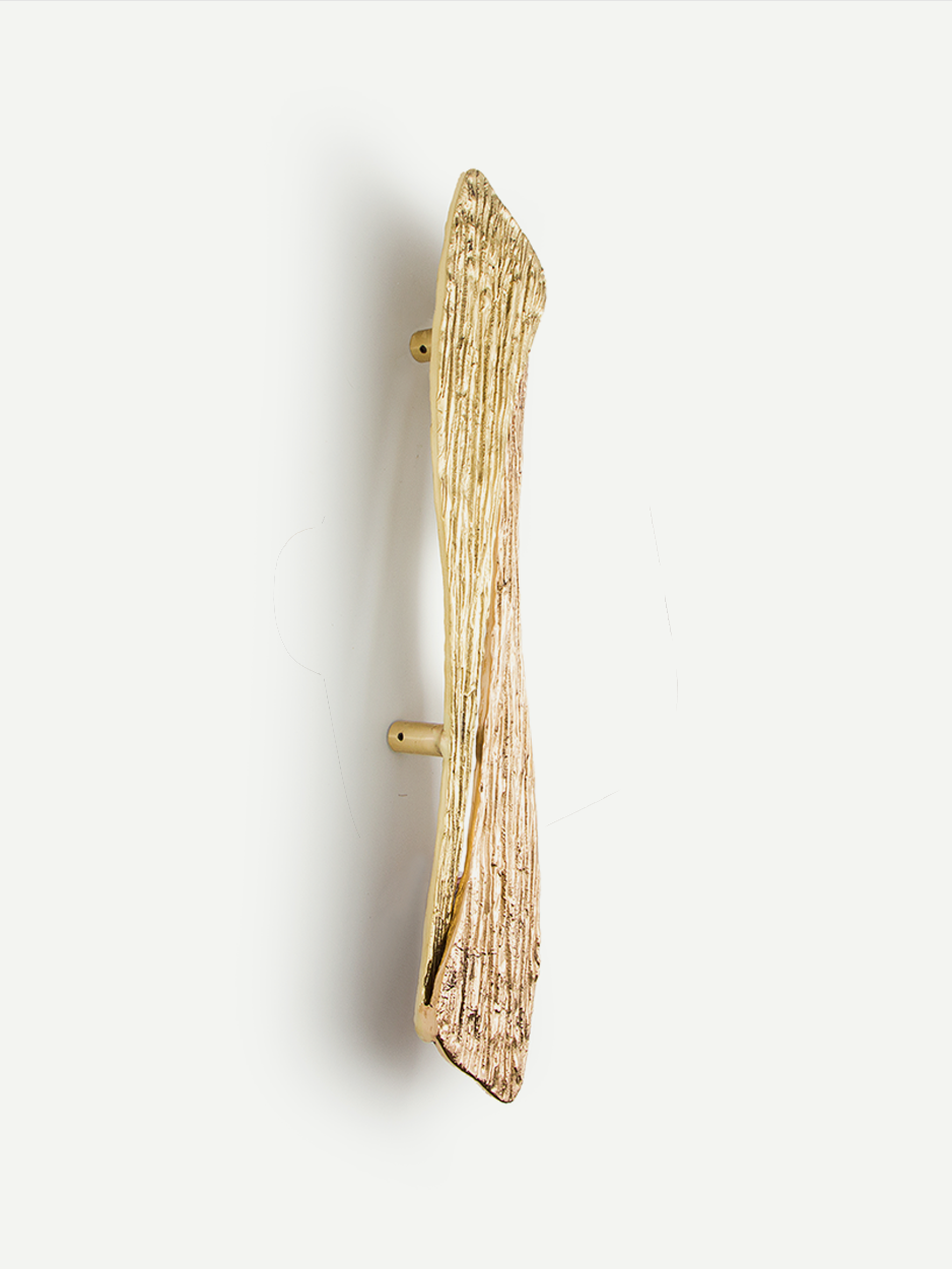 Modern entryway pull handle for pivot front doors.