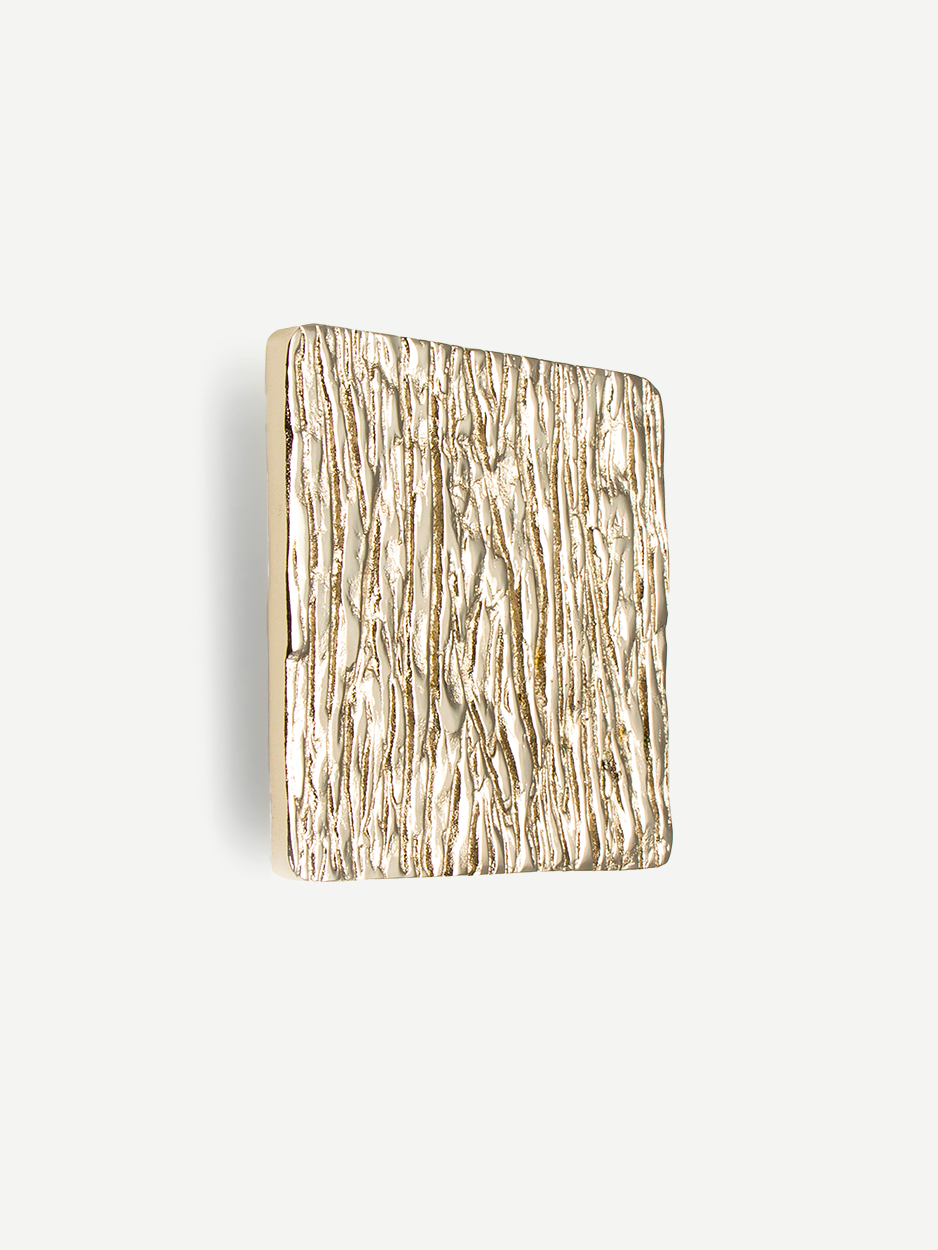 Close-up of the cabinet pull in satin nickel finish, textured to resemble the bark and branches of a willow tree, offering a contemporary and modern touch inspired by nature.